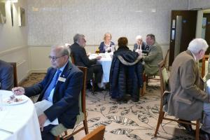 People sitting at dining tables